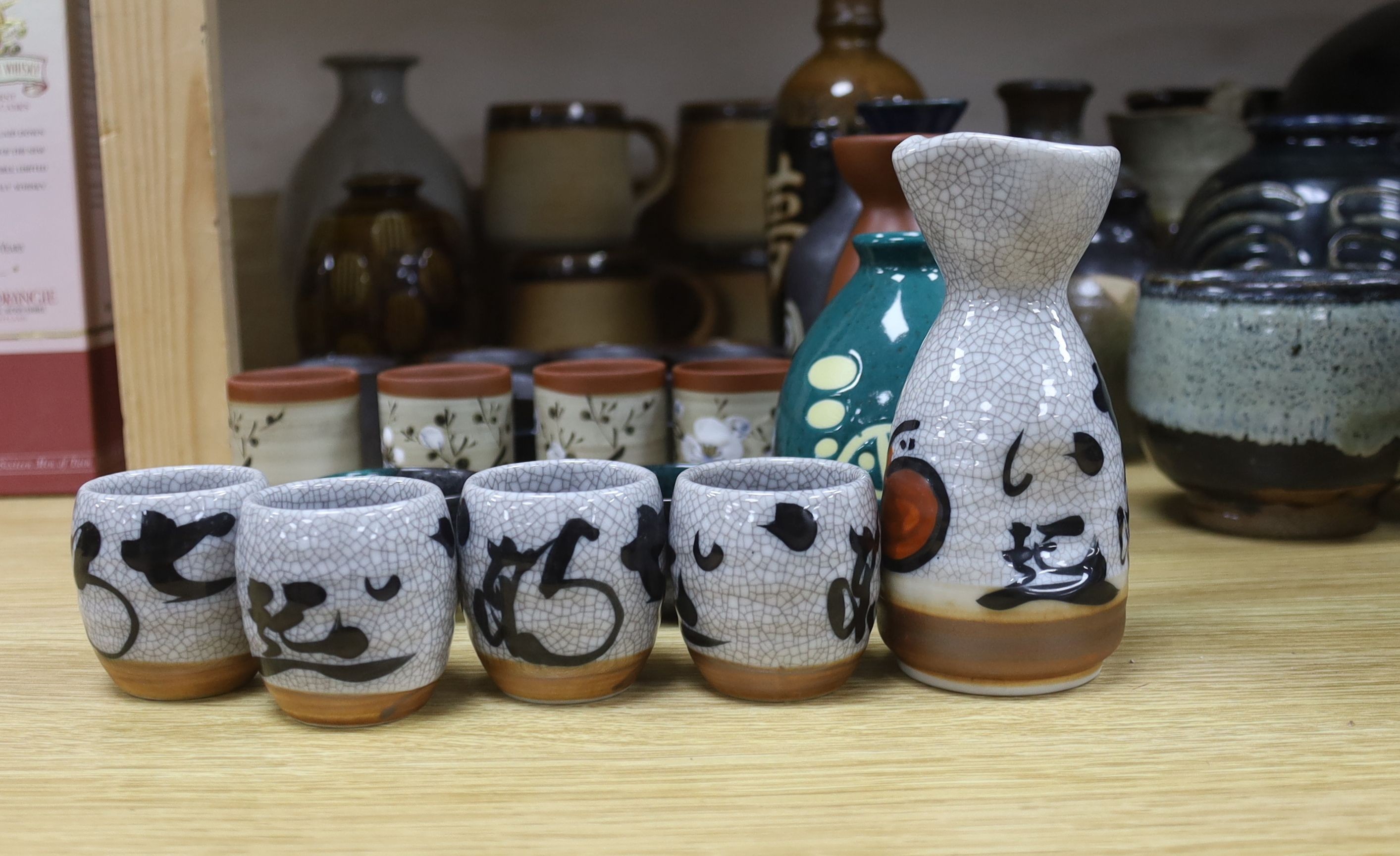 A collection of Studio pottery vases and a Bellarmine